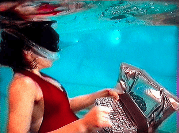 ©Debra Solomon, the_living, 1997-1998. (C) Debra Solomon. Video still from Project the-living_s Wardrobe of Live Moments (1997-2000).png